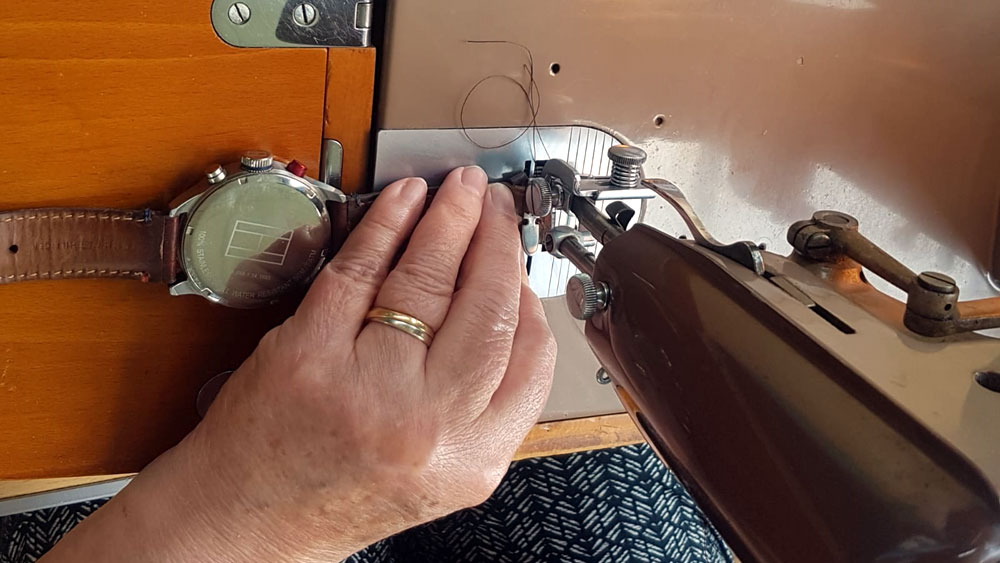 Repairing a leather watch strap at the Crowborough Repair Café